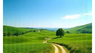 Scenic Czech countryside with rolling hills and blue sky